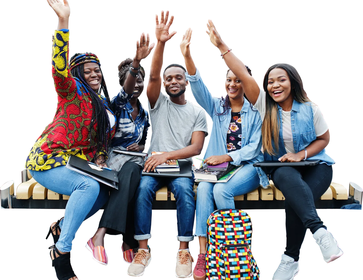 Five smiling students sitting together with their hands raised